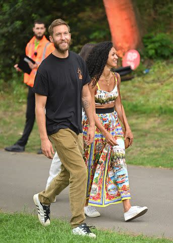 <p>Karwai Tang/WireImage</p> Calvin Harris and Vick Hope in London at the Chelsea Flower Show on May 23, 2022