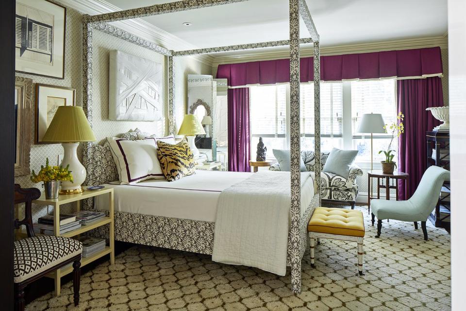 <p>When designing your main bedroom, the only real rule is to be true to your personal style. If that means mixing fun prints and using bold colors, don't hesitate to do so. Take inspiration from Matthew Carter's bold purple window treatments. </p>