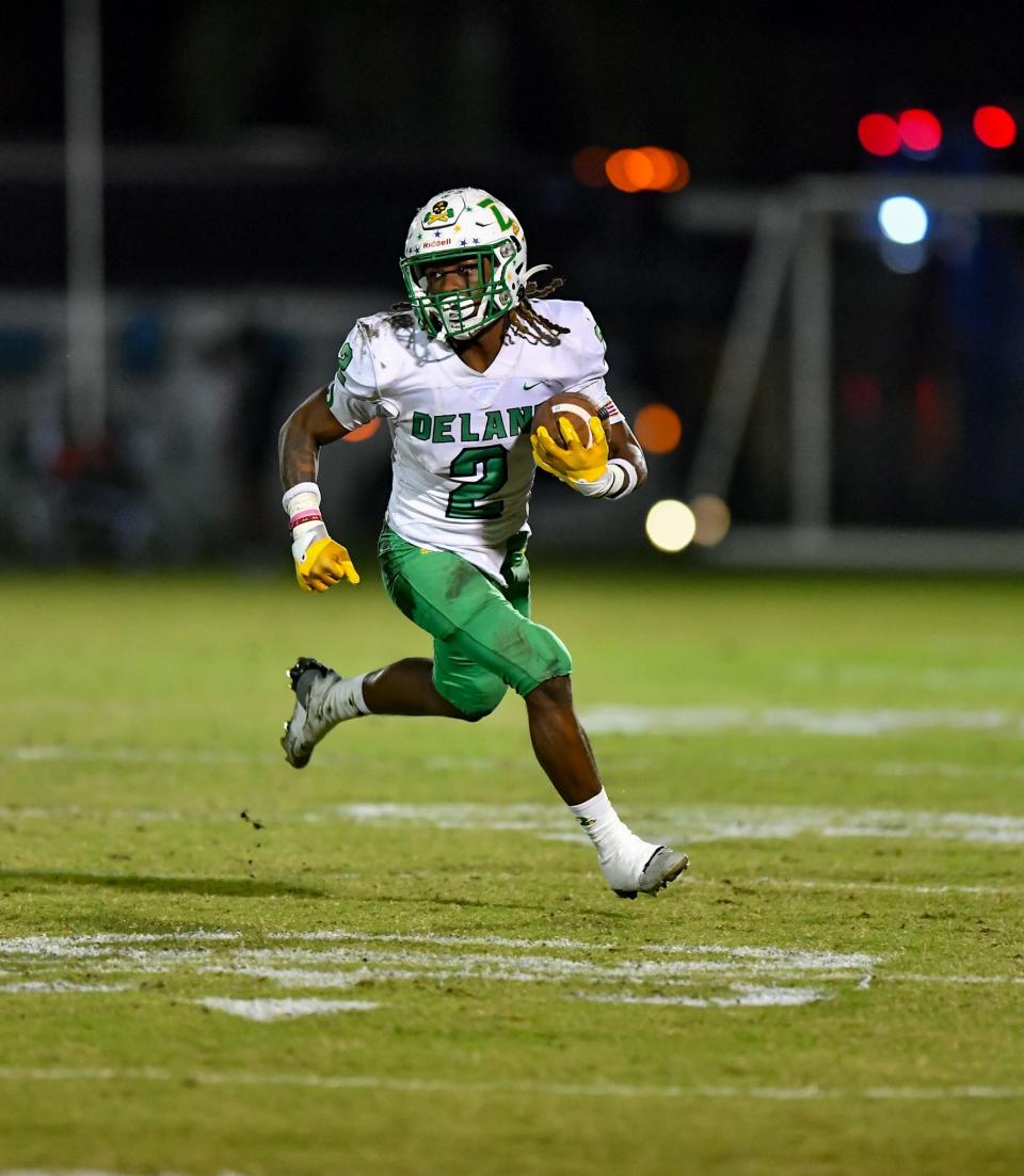 DeLand running back Ladamion Bletcher (2) carries the ball in a high school football Regional 3-4S final against Treasure Coast on Friday, Nov. 24,2022, Port St. Lucie.