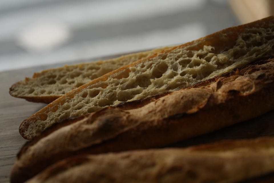 Baguettes are seen at the Utopie bakery Friday, April 26, 2024 in Paris. Baker Xavier Netry was chosen this week as the 31st winner of Paris' annual "Grand Prix de la baguette" prize. The Utopie bakery in Paris' 11th district that Netry works for wins 4,000 euros ($4,290) and becomes one of the suppliers of the presidential Elysee Palace for a year. (AP Photo/Thibault Camus)