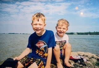 Brothers Kurt, left, and Austin are pictured at a cottage in their younger years. (Christine Padaric - image credit)