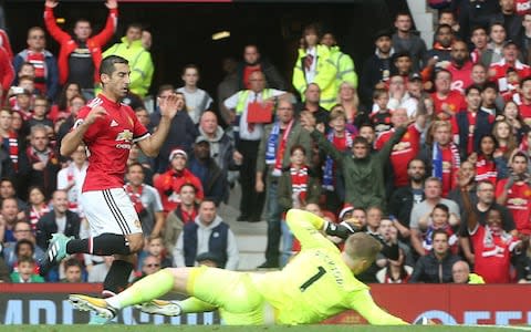 Mkhitaryan sweeps in the second - Credit: Matthew Peters/Man Utd via Getty Images