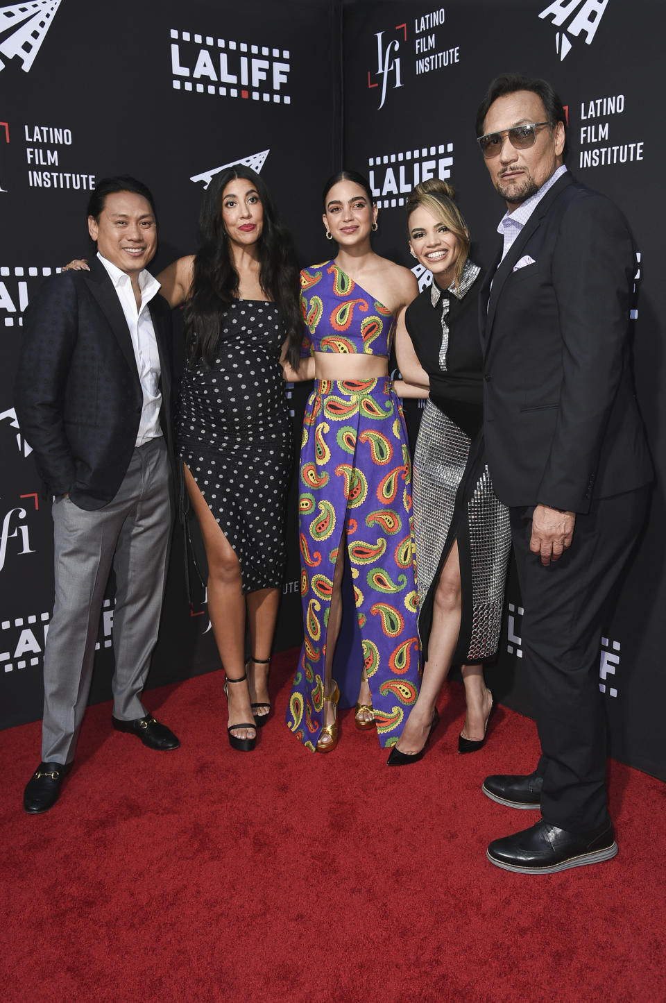 Jon M. Chu, Stephanie Beatriz, Melissa Barrera, Leslie Grace and Jimmy Smits, form left, arrive at a screening of "In the Heights" during the Los Angeles Latino International Film Festival at TCL Chinese Theatre on Friday, June 4, 2021, in Los Angeles. (Photo by Richard Shotwell/Invision/AP)