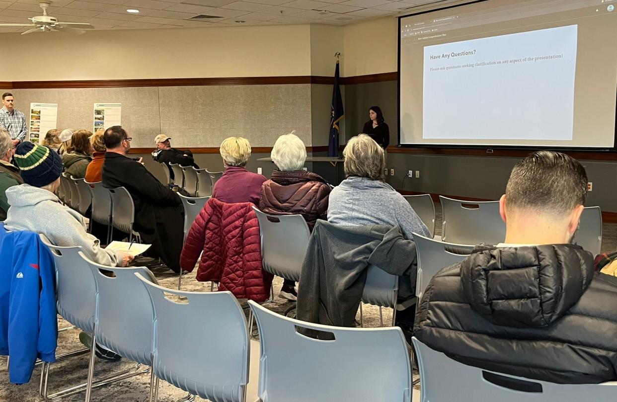 Olivia Nix, a community development planner with the Michiana Area Council of Governments, discusses comprehensive plan that is being developed for New Carlisle on Tuesday at the New Carlisle-Olive Township Public Library. The plan is important to ensure that the massive amount of development going on in nearby Olive Township doesn't have an adverse impact on the town's small-town charm.