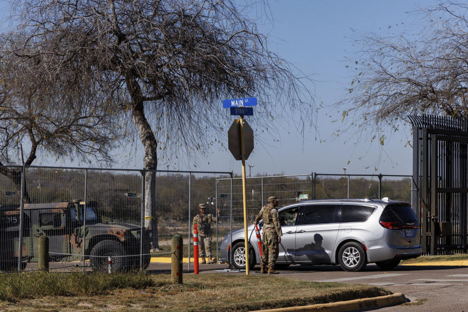 Texas Department of Public Safety officers guard an entrance to Shelby Park on Thursday, Jan. 11, 2024, in Eagle Pass, Texas. The Justice Department on Friday, Jan. 12, asked the Supreme Court to order Texas to stop blocking Border Patrol agents from a portion of the U.S.-Mexico border where large numbers of migrants have crossed in recent months, setting up another showdown between Republican Gov. Greg Abbott and the Biden administration over immigration enforcement. (Sam Owens /The San Antonio Express-News via AP)