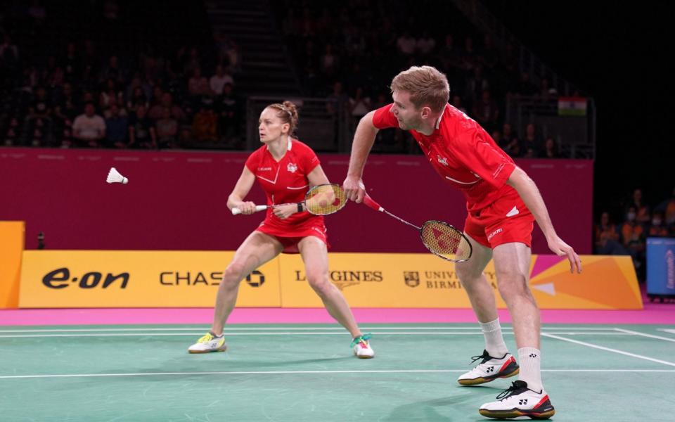 England's Marcus Ellis and Lauren Smith in action against Singapore's Yong Hee and Jessica Tan during the Mixed Doubles Gold Medal match at The NEC - PA