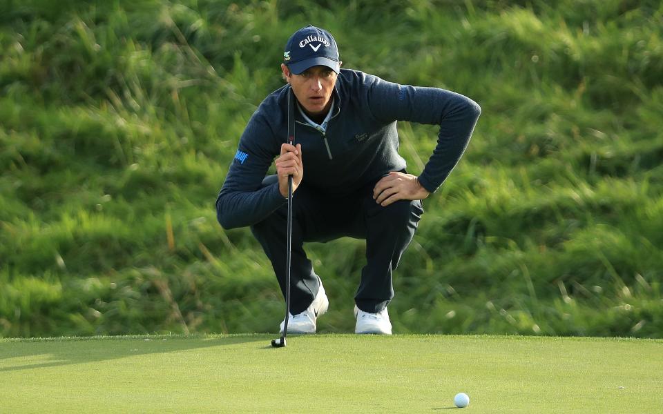 Nicolas Colsaerts lines up a putt at Le Golf National on Friday - 2019 Getty Images