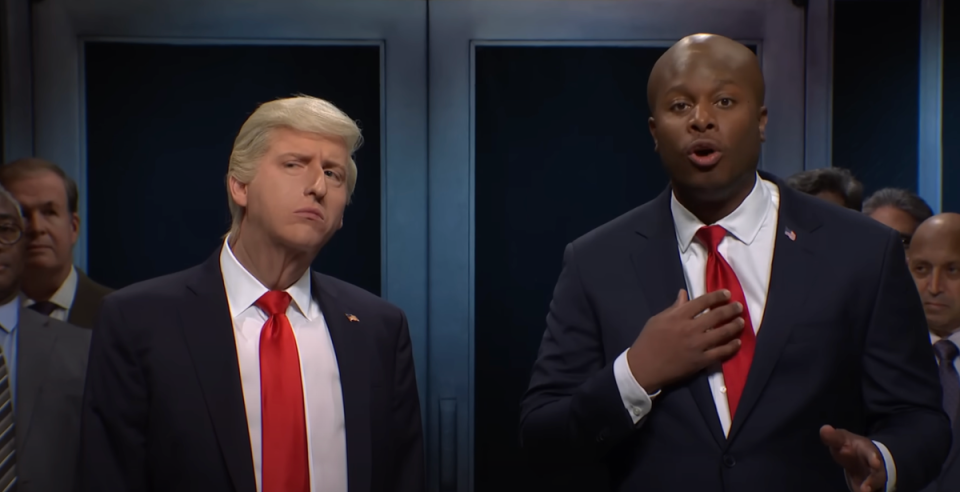 James Austin Johnson (left) dressed as Donald Trump stands next to Devon Walker (right) dressed as Senator Tim Scott (Saturday Night Live)