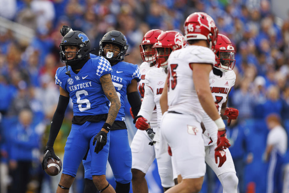 Kentucky wide receiver Dane Key (6) celebrates getting a first down against Louisville during the first half of an NCAA college football game in Lexington, Ky., Saturday, Nov. 26, 2022. (AP Photo/Michael Clubb)