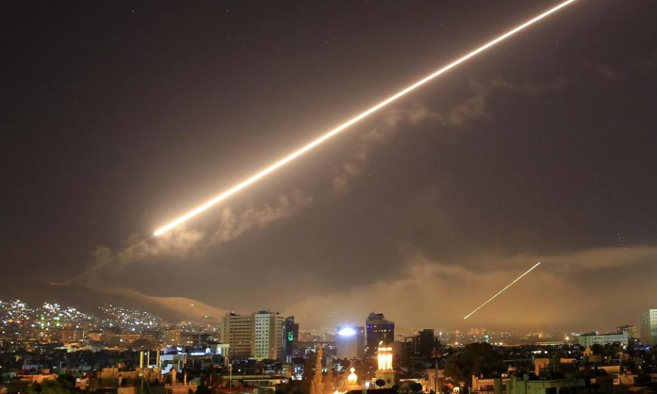 Damascus skies erupt with surface to air missile fire as the US launches an attack on Syria