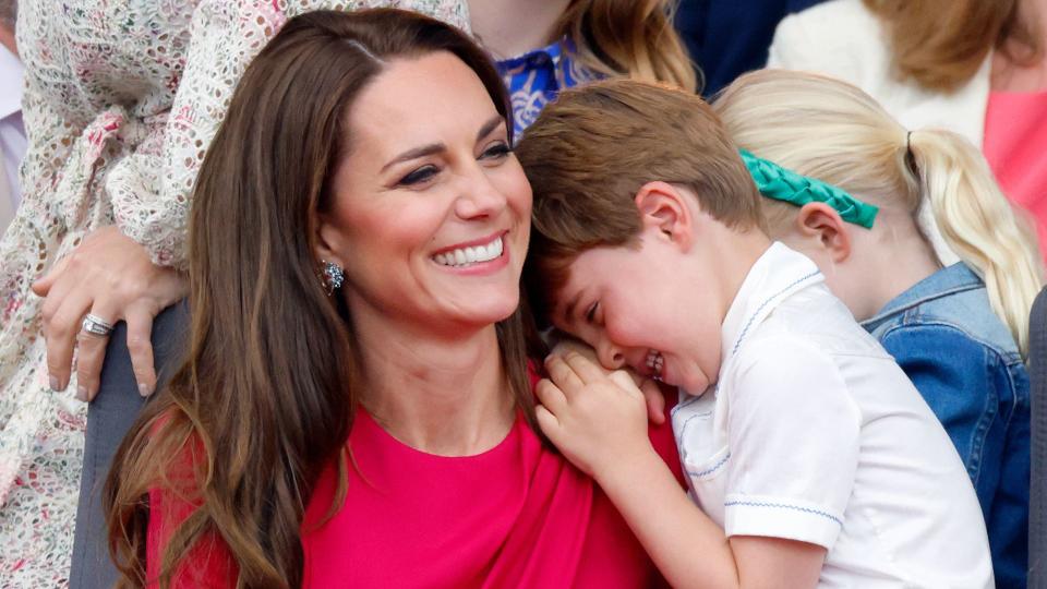 Kate snuggles with her youngest