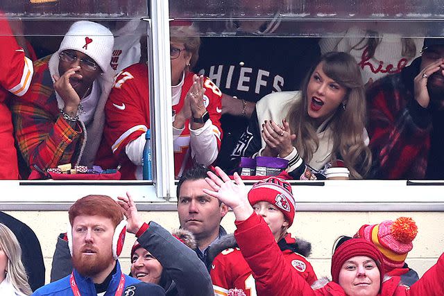 <p>Jamie Squire/Getty Images</p> Taylor Swift cheers during the first quarter between the Cincinnati Bengals and the Kansas City Chiefs at GEHA Field at Arrowhead Stadium on December 31, 2023 in Kansas City, Missouri.