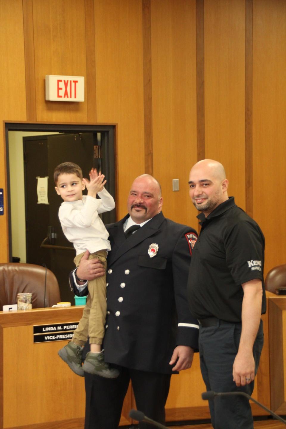 Fire Lieutenant Alexander Arruda after his swearing in and pinning ceremony Thursday in Fall River.