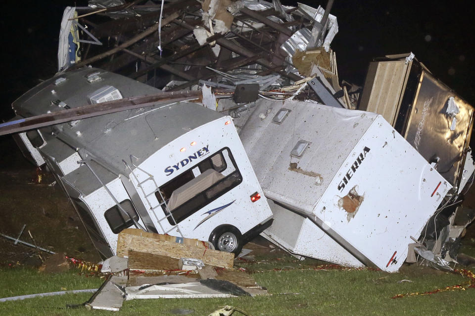 Travel trailers and motor homes are piled on top of each other at Mayflower RV in Mayflower, Ark., Sunday, April 27, 2014.A powerful storm system rumbled through the central and southern United States on Sunday, spawning tornadoes. (AP Photo/Danny Johnston)