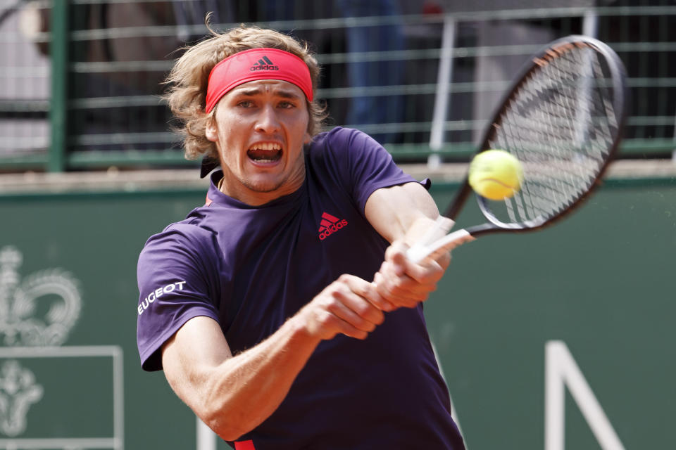 Alexander Zverev, of Germany, returns a ball to Federico Delbonis, of Argentina, during their semi final match, at the ATP 250 Geneva Open tournament in Geneva, Switzerland, Friday, May 24, 2019. (Salvatore Di Nolfi/Keystone via AP)