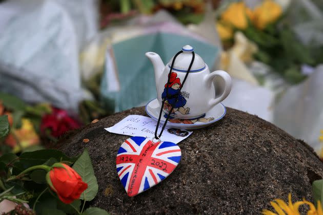 A Paddington Bear teapot is seen with floral tributes left outside the Sandringham Estate in Norfolk (Photo: LINDSEY PARNABY via Getty Images)