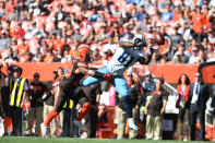 <p>Jonnu Smith #81 of the Tennessee Titans dives to catch a pass defended by Christian Kirksey #58 of the Cleveland Browns in the first quarter at FirstEnergy Stadium on October 22, 2017 in Cleveland, Ohio. The pass was ruled incomplete. (Photo by Jason Miller/Getty Images) </p>