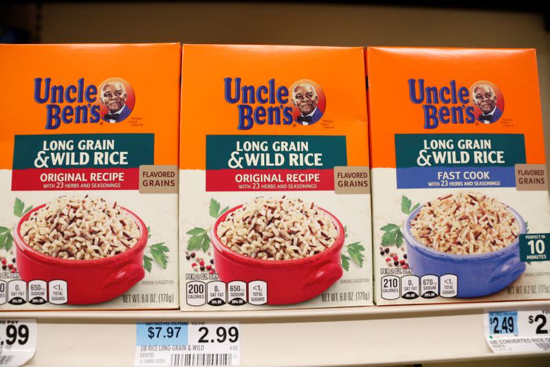 Boxes of Uncle Ben's branded rice stand on a store shelf inside of a shop in the Brooklyn borough of New York City