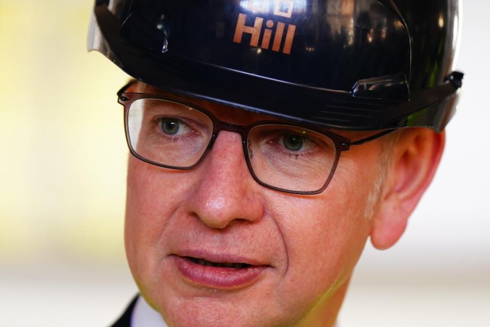 Michael Gove during a housing visit in West London. Photo: PA