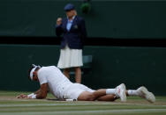 Tennis - Wimbledon - All England Lawn Tennis and Croquet Club, London, Britain - July 11, 2018 Argentina's Juan Martin Del Potro after falling during his quarter final match against Spain's Rafael Nadal REUTERS/Andrew Couldridge