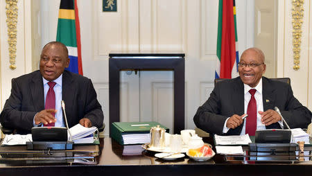 South African President Jacob Zuma and Deputy President Cyril Ramaphosa, are seen attending Cabinet Committee meetings in this government handout picture in Cape Town, South Africa, February 7, 2018. GCIS/Handout via REUTERS