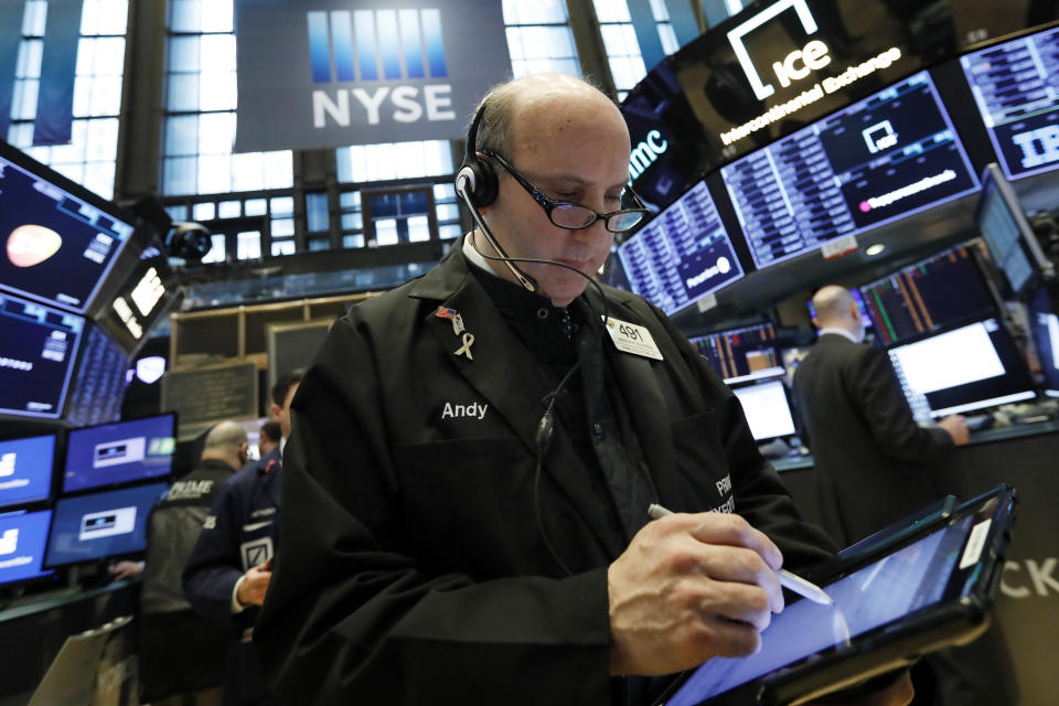 Trader Andrew Silverman works on the floor of the New York Stock Exchange, Tuesday, March 12, 2019. Another slide in Boeing weighed on the Dow Jones Industrial Average. (AP Photo/Richard Drew)