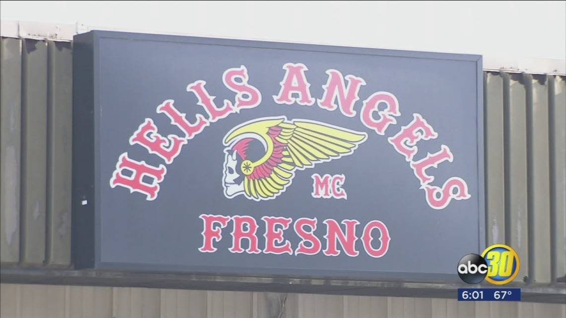 The Winged Death’s Head of the Hells Angels stood above the entrance to the outlaw club on South G Street.