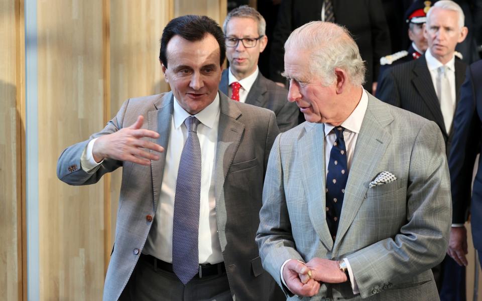 Pascal Soriot talks to Prince Charles during a visit at the AstraZeneca facility in Cambridge - Chris Jackson