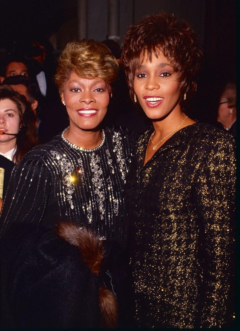 <p>While it's rare to have two musical legends in one family, Dionne Warwick and Whitney Houston are the exception. The cousins were extremely close, often collaborating both on the stage and in the studio. A month after Whitney's tragic passing, Dionne opened up about their relationship, <a href="https://www.youtube.com/watch?v=iQ6BGyDy_Ak" rel="nofollow noopener" target="_blank" data-ylk="slk:telling ABC News;elm:context_link;itc:0;sec:content-canvas" class="link ">telling <em>ABC News</em></a>, "She basically was the little girl I never had." </p>