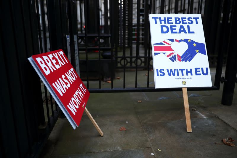 Anti-Brexit signs are pictured at the gates of Downing Street in London