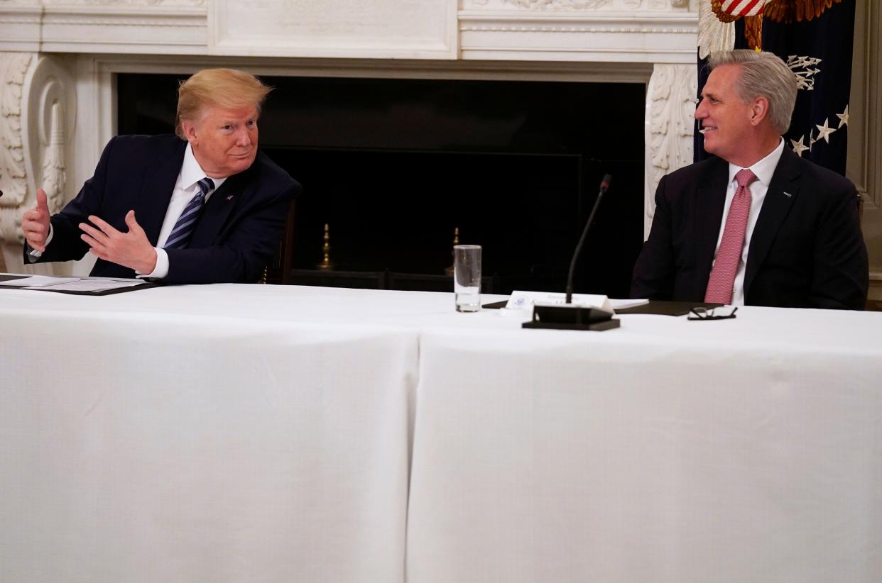 President Donald Trump speaks with House Minority Leader Kevin McCarthy (R-Calif.) during a meeting with Republican lawmakers Friday at the White House. (Photo: Evan Vucci/ASSOCIATED PRESS)