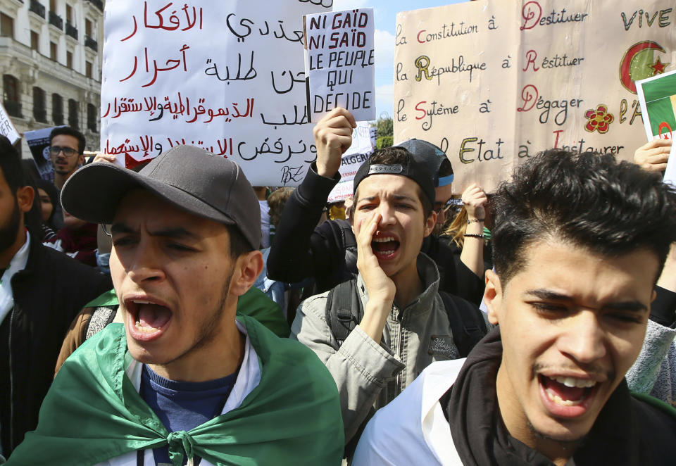 Algerian students shouts as they march during a protest in Algiers, Algeria, Tuesday, April 2, 2019. Algerian protesters and political leaders are expressing concerns that ailing President Abdelaziz Bouteflika's departure will leave the country's secretive, distrusted power structure in place. (AP Photo/Anis Belghoul)