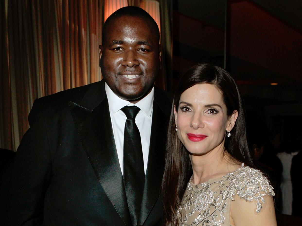 Quinton Aaron and Sandra Bullock.