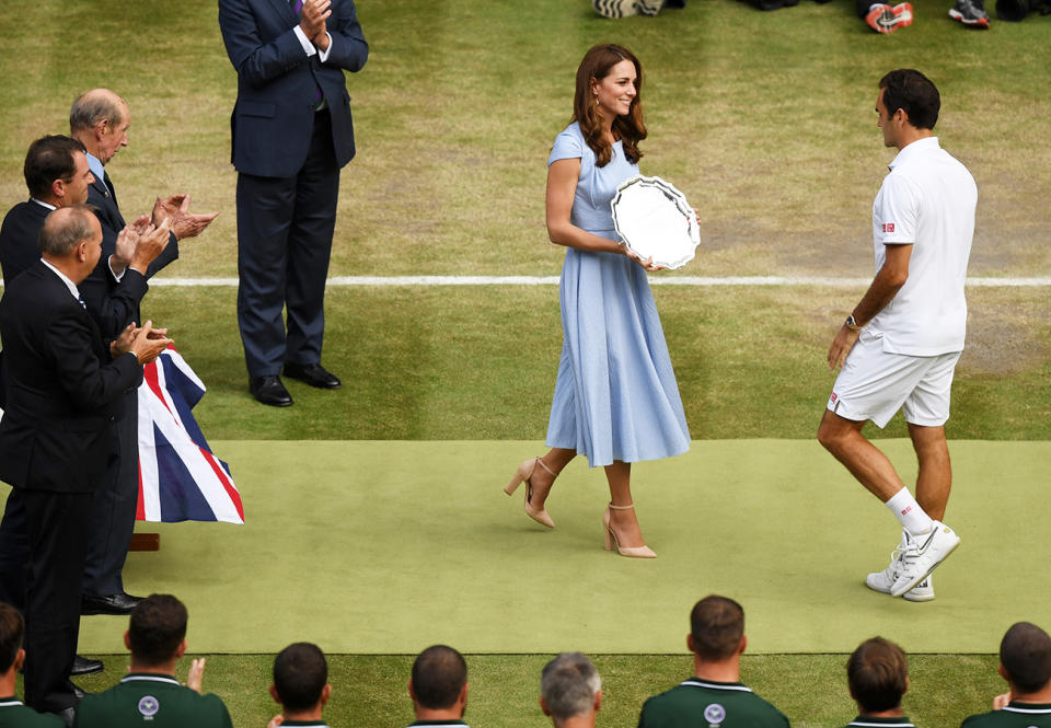 Roger Federer, pictured here, is presented with the runner-up trophy by the Duchess of Cambridge after the 2019 Wimbledon final.