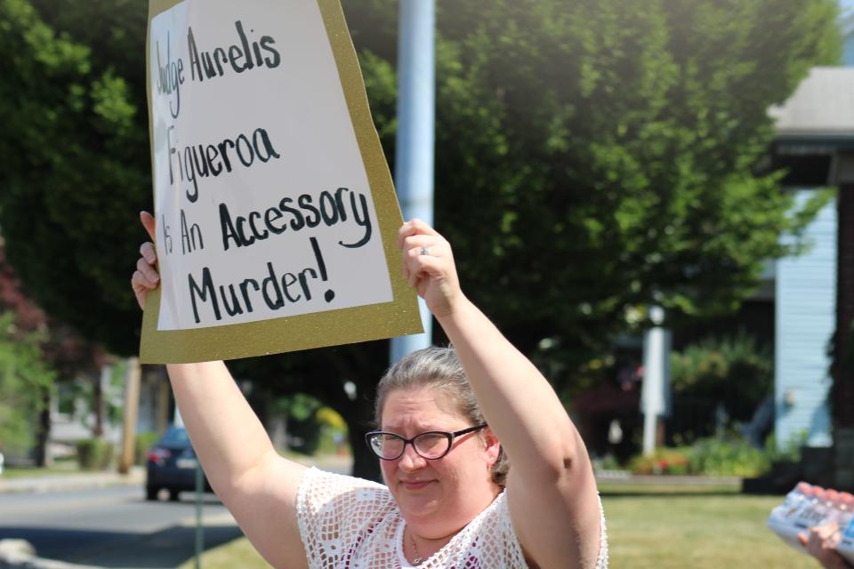 Amber High organized the Friday morning protest held in front of Magisterial District Judge Aurelis Figueroa's office June 2, 2023.