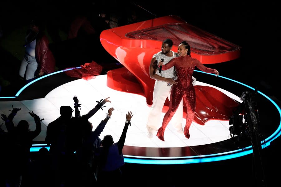 Usher and Alicia Keys perform during halftime of the NFL Super Bowl 58 football game between the San Francisco 49ers and the Kansas City Chiefs on Sunday, Feb. 11, 2024, in Las Vegas. (AP Photo/Charlie Riedel)