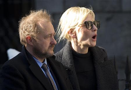 Actress Cate Blanchett (R) and her husband Andrew Upton arrive for the funeral of actor Philip Seymour Hoffman at St. Ignatius chuch in the Manhattan borough of New York February 7, 2014. REUTERS/Carlo Allegri