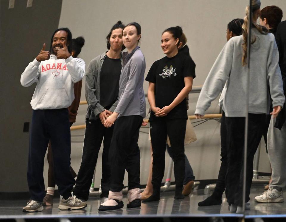 Remi Okamoto, center, stands with other Charlotte Ballet dancers prior to working on the choreography for “Nutcracker.”
