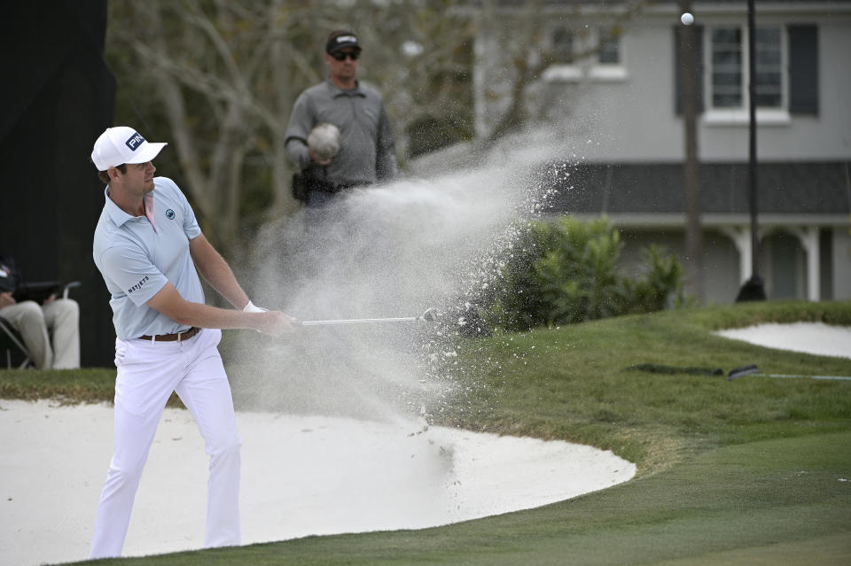 FILE - In this March 8, 2020, file photo, Harris English hits out of a bunker onto the 14th green during the final round of the Arnold Palmer Invitational golf tournament in Orlando, Fla. Before the PGA Tour season was halted by the coronavirus, English worked his way up to No. 24 in the FedEx Cup. (AP Photo/Phelan M. Ebenhack, File)
