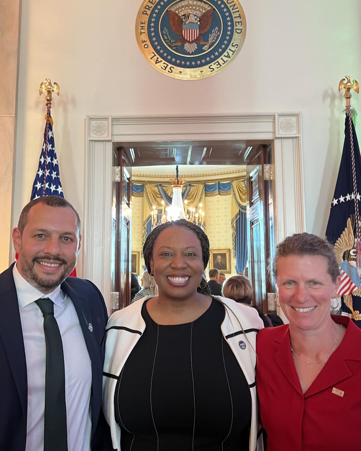 From left: Mathew Shurka,  Imani Rupert-Gordon, National Center for Lesbian Right's executive director and Julie Gonen, the center's federal policy director, on the day President Biden signed an order to help broaden protections for LGBTQ youth. (Mathew Shurka) 