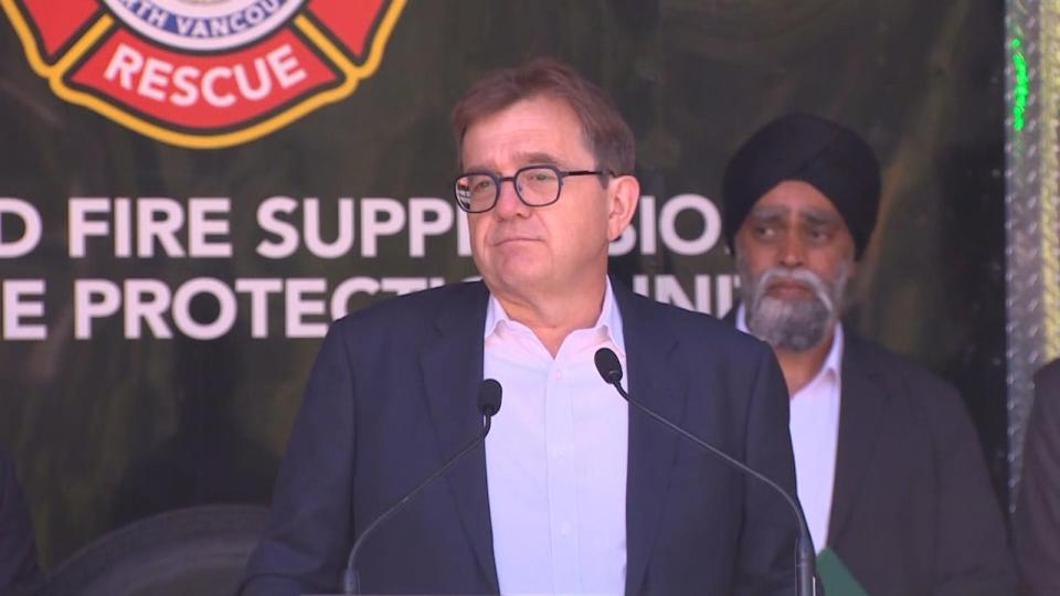 Natural Resources Minister Jonathan Wilkinson, pictured here with Public Safety Minister Harjit Sajjan at a news conference on Aug. 11, says that interface fires will be the focus of new training funding from the federal government.