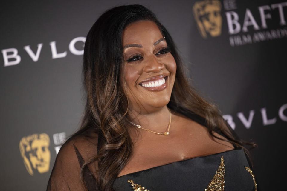 Alison Hammond poses for photographers on Feb. 18, 2023, upon arrival for the BAFTA Nominees Party in London. (Photo by Vianney Le Caer/Invision/AP)