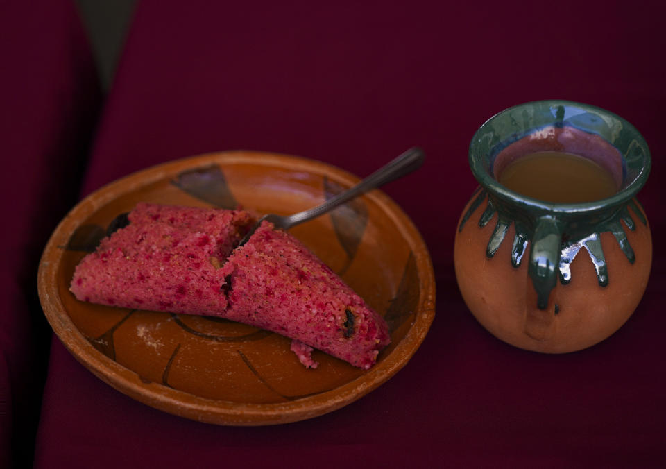 A sweet tamal made with blackberries is displayed on a table during the tamales fair in the Ixtapalapa neighborhood of Mexico City, Friday, Jan. 27, 2023. From north to south, hundreds of savory and sweet tamal varieties proliferate in Mexico. (AP Photo/Fernando Llano)