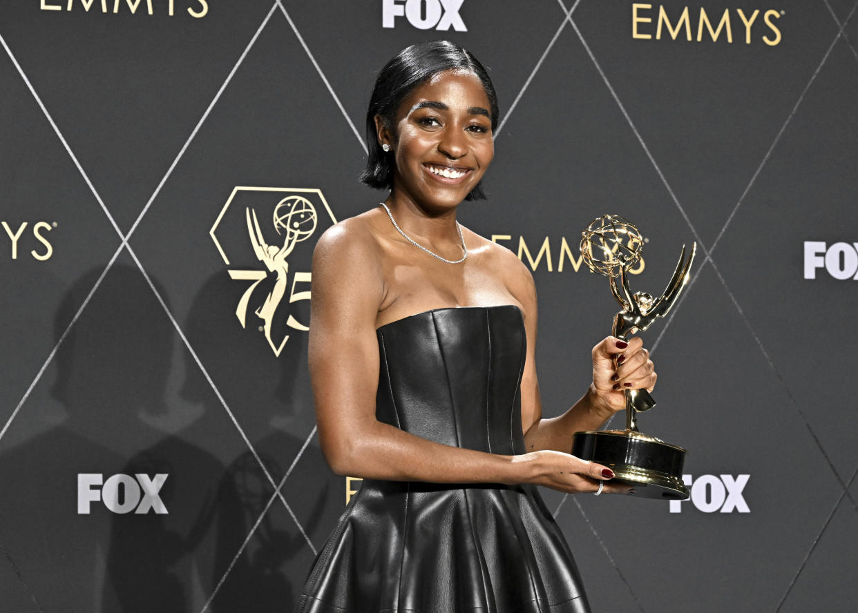 Ayo Edebiri poses in the pressroom with the Emmy for supporting actress in a comedy series for The Bear at the 75th Emmy Awards on Monday, Jan. 15, 2024 at the Peacock Theater in Los Angeles. (Photo by Dan Steinberg/Invision for the Television Academy/AP Images)