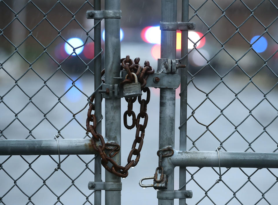 A gate is locked in front of Great Mills High School.&nbsp;