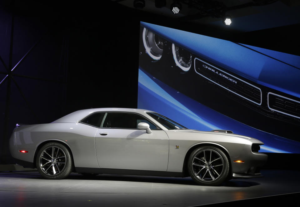 The 2015 Dodge Challenger is introduced at the New York International Auto Show in New York, Thursday, April 17, 2014. (AP Photo/Seth Wenig)
