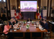 Canada's Minister of Foreign Affairs Chrystia Freeland is joined by France's Minister of Europe and Foreign Affairs Jean-Yves Le Drian, Acting U.S. Secretary of State John J. Sullivan, Britain's Foreign Secretary Boris Johnson, High Representative for the European Union's Foreign Affairs Federica Mogherini, Italy's Minister of Foreign Affairs Angelino Alfano, Japan's Minister of Foreign Affairs Taro Kono and Minister of Foreign Affairs for Germany Heiko Maas at opening remarks on the first day of foreign ministers meetings from G7 countries in Toronto, Ontario, Canada April 22, 2018. REUTERS/Fred Thornhill