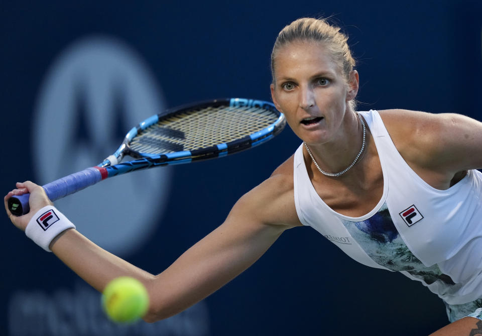 Karolina Pliskova, of the Czech Republic, prepares to hit a forehand to Brazil's Beatriz Haddad Maia during the semifinals of the National Bank Open tennis tournament Saturday, Aug. 13, 2022, in Toronto. (Nathan Denette/The Canadian Press via AP)