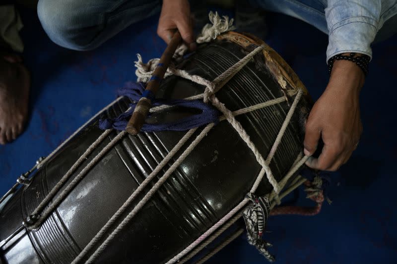 Kashmiri Ramadan drummers wake Muslims up for their meal before daybreak, in Srinagar