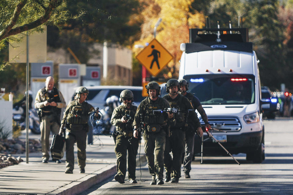 Police work the scene of a shooting on the University of Nevada, Las Vegas, campus on Wednesday, Dec. 6, 2023, in Las Vegas. (Madeline Carter/Las Vegas Review-Journal via AP)